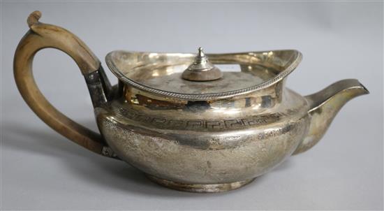 A George III silver teapot by Robert, David & Samuel Hennell, London, 1801, gross 17.9 oz.
